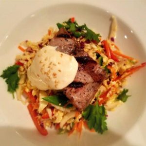 Grilled Tuna with Citrus-Ginger Aioli Served on Thai Crunch Slaw with Peanut Dressing