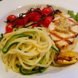 Mediterranean Pasta with Grilled Swordfish topped with Preserved Lemon Butter served with Roasted Tomatoes