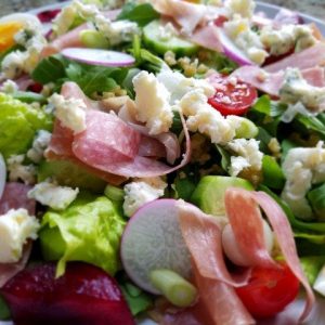 Salami & Prosciutto Salad with Plums, Blue, Tomato, Radish, Egg & Freekeh